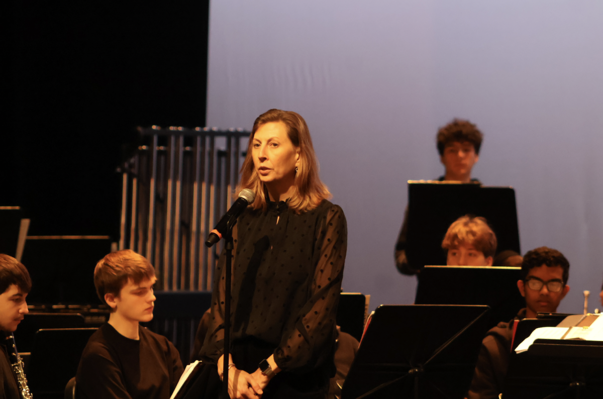 Before the performers begin playing, fine arts director Susan Memoli presents the Honors Wind Ensemble. They performed three songs, conducted by band director Joseph Oneshuck.